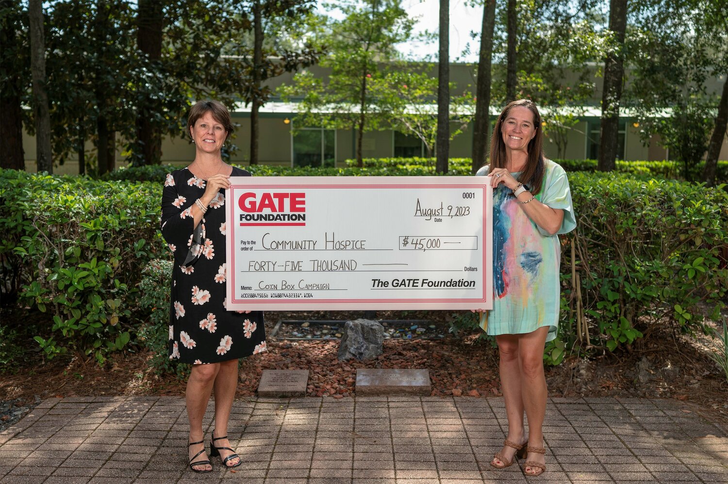 Pictured from left are Kathy Brady, executive director of the GATE Foundation, and Annie Tuttle, executive director of The Foundation of Community Hospice & Palliative Care.